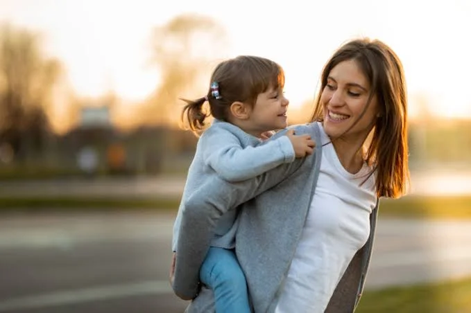 Parent and child connecting with warmth and understanding